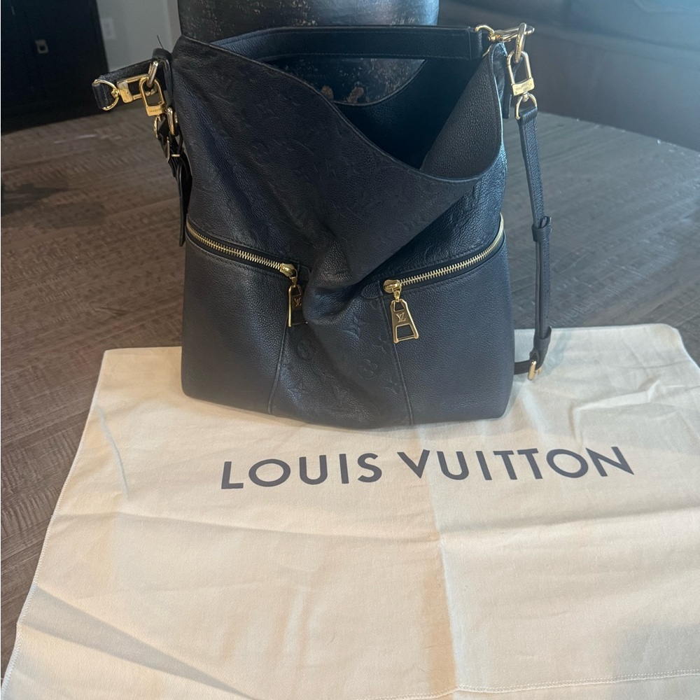 Black Designer Shoulder Bag with original storing bag.